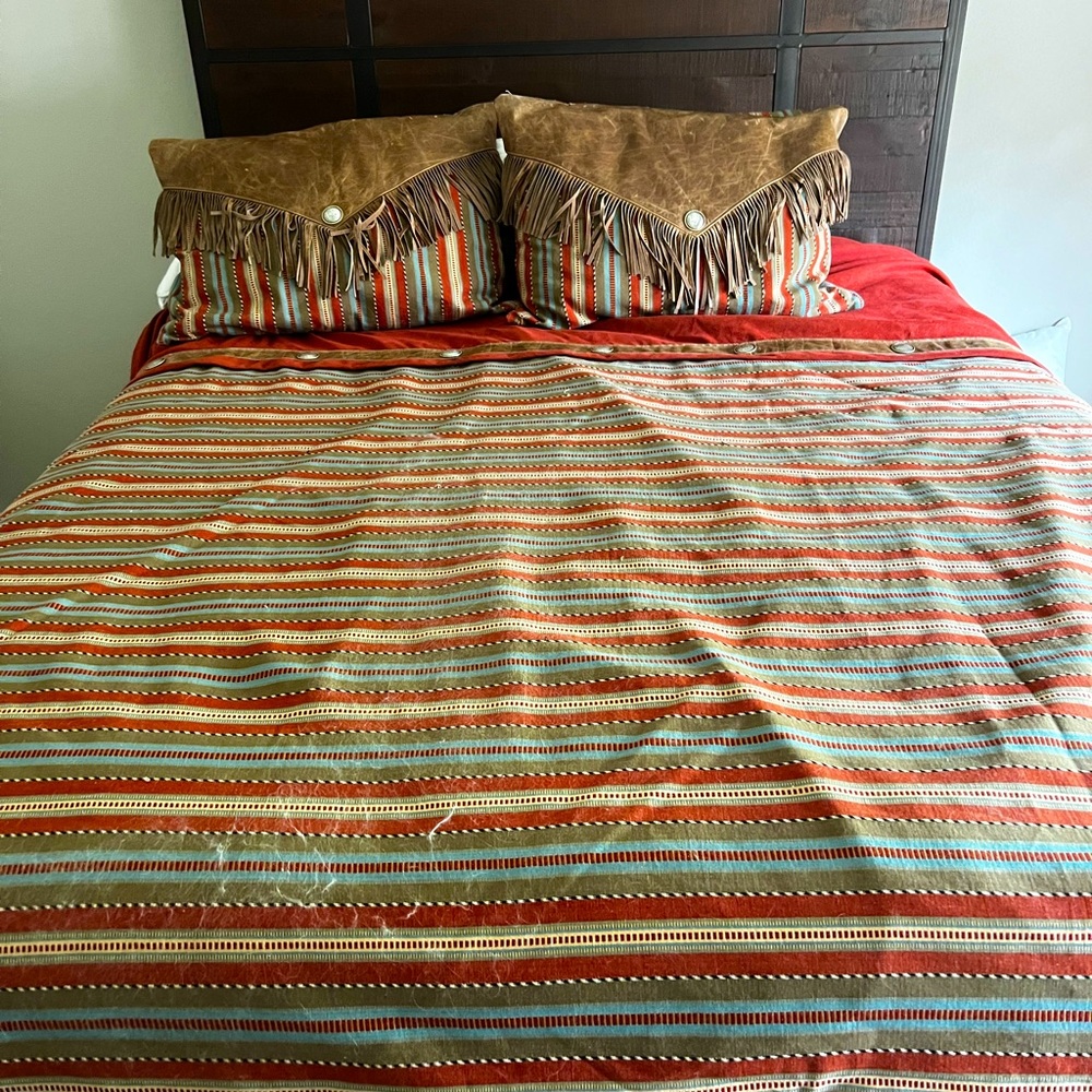 Custom duvet cover and two standard shams with pillows.